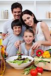 Smiling family cooking together in the kitchen