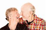 Smiling senior couple touching their noses together