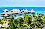 Overwater bungalows in tropical Bora Bora, Tahiti