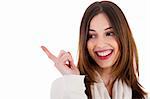 attractive female model smiling and pointing her finger at copy space on white background