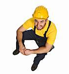 fine portrait of manual worker sit on his tool box isolated on white background