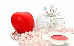 Valentine hearts,candle,,pink pearls on white background.