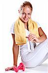 woman holding a bottle of water on a white background