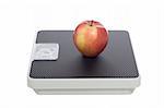 diet concept, Red apple on a scale, isolated over white