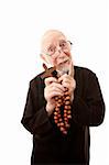 Funny priest with beads and large wooden cross