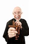 Priest warding off evil with wooden cross