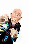 Funny Priest in Robe with Glasses Blowing Bubbles
