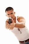 Hispanic man with tattoo aiming small automatic pistol