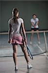 two girls recreating tennis sport