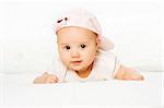 Portrait baby girl wearing pink hat