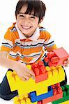 Cute little boy play on white isolated background