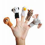 Female hand wearing 5 finger puppets; bear; panda; duck; giraffe; elephant