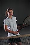 Young beautiful women  playing tennis indoor