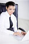 Portrait of beautiful business woman with headset in office