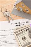 Foreclosure Notice, Home, House Keys and Stack of Money - Cash for Keys Program.