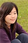 Smiling Asian beauty portrait in outdoor of park.