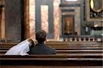 Bride and groom are sitting in the church