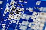 Blue circuit board close-up, shallow dof, selected focus.