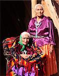 Two Navajo Women in Traditional Clothing Who Are Mother and Daughter Outdoors