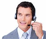 Confident young businessman using headset against a white background