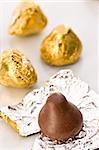 sweet, chocolate candy on the golden foil