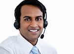 Posotive sales representative man with an headset against white background