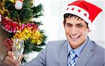 Caucasian businessman celebrating christmas in the company