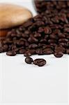 Spilled coffee beans. Shallow dof, copy space