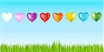 Row Of Colorful Heart Shape Balloons With Golden Bow Above Grass