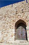 Main entry of the Pigeon Island Fortress, also known as the Pirates castle, in the Kusadasi harbor, on the Aegean coast of Turkey.