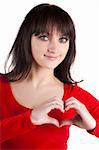 young beautiful woman showing heart symbol. Isolated over white background .