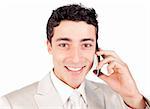 Attractive ethnic businessman talking on phone against a white background