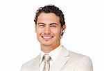 Portrait of a young businessman smiling at the camera against a white background