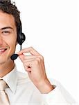 Close-up of a young businessman using headset isolated on a white background