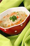 Chicken or turkey soup with carrot, noodles and parsley