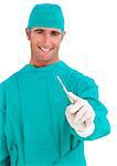 Assertive surgeon holding a scalpel against a white background