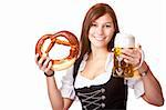 Happy woman in dirndl dloth holding Oktoberfest beer stein and pretzel in hands. Isolated on white.