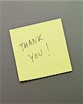 Adhesive Note with "Thank You" wrote on it