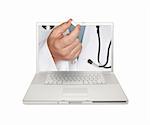 Doctor Handing Pill Through Laptop Screen Isolated on a White Background.