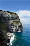 Volcanic geologic formation of Morro de Castelo Branco in Faial island, Azores, Portugal