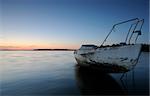 old abandoned boat in a bay