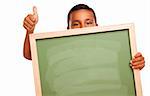 Cute Hispanic Boy Holding Blank Chalkboard and Thumbs Up Isolated on a White Background.
