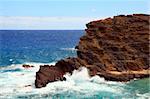 A rugged cliff on the shore of Oahu, Hawaii