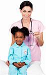 Afro-american little girl attending medical check-up isolated on a white background