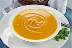 Delicious hearty homemade pumpkin soup ready to serve.