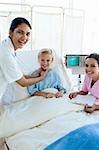 Female Doctor and nurse examining a patient in a hospital