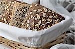 Basket with different kinds of wholemeal bread