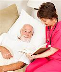 Patient enjoys listening to a story as a home health nurse reads to him.
