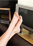 Close-up of woman's foot in a living-room at home