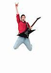 picture of a passionate guitarist making a jump and a rock and roll hand gesture